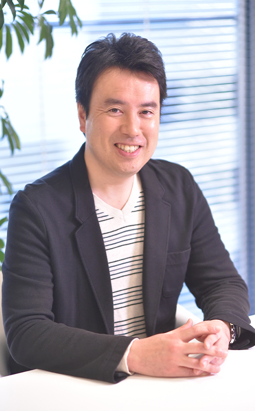 取締役 ECソリューションズ統括 粕谷 吉正